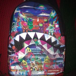 SPRAYGROUND LENTICULAR LAND OF ASTRO SHARKS